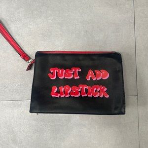 Black makeup/ toiletries bag w/ zipper and wristlet handle